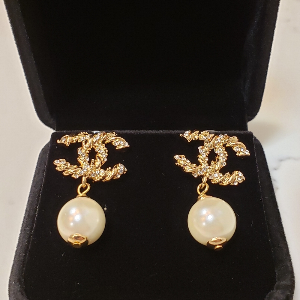 Vtg Coco Chanel gold crystal embellished earrings